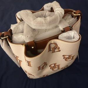 Dooney and Bourke purse! Brand new, still in original packaging.